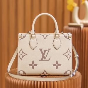 Louis Vuitton  PM Monogram Empreinte Creme